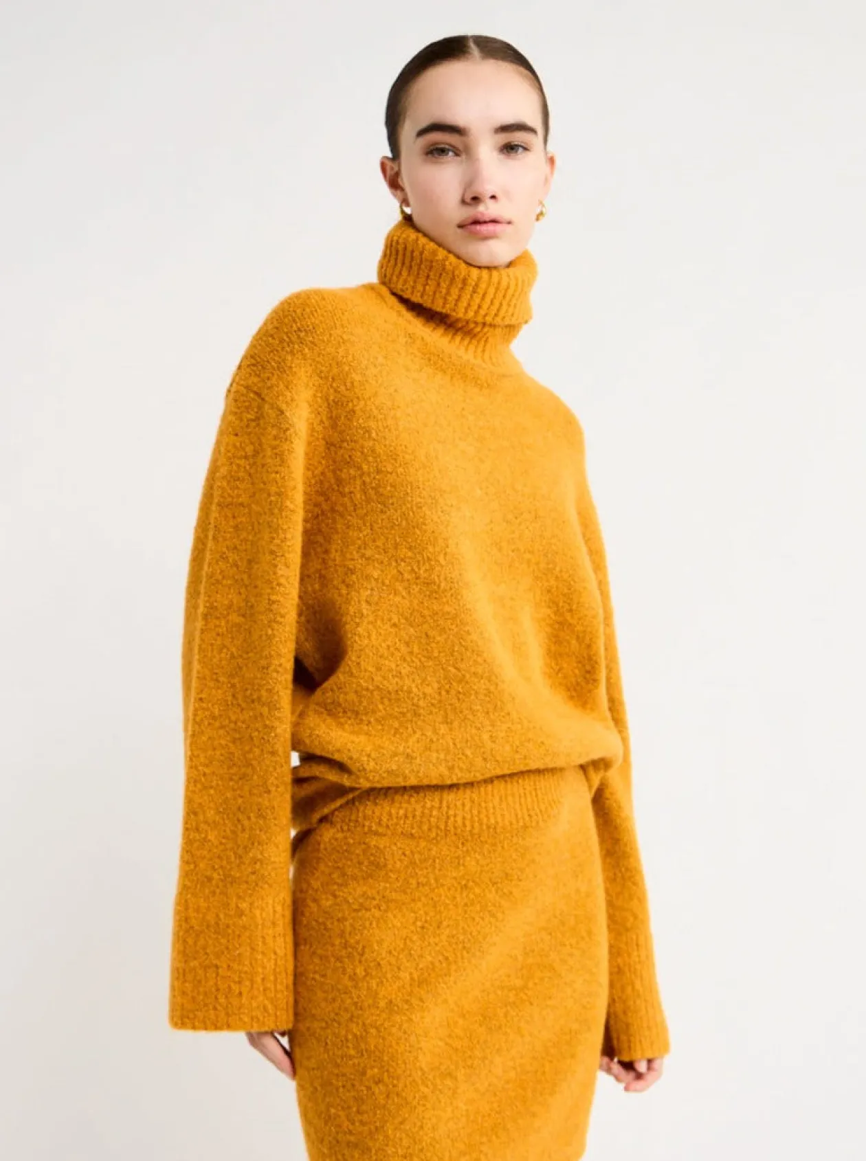 Shop Lotus Knit Turtleneck In Women Tops